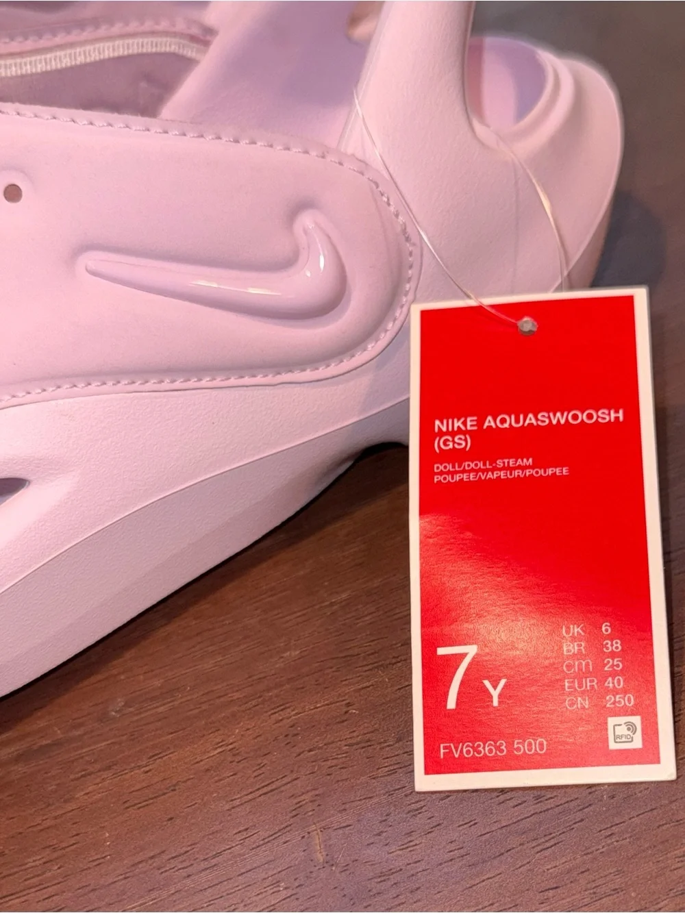 Nike Aquaswoosh Slide Sandal in Light Pink